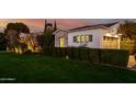 Home's exterior, showcasing the garage and landscaping at 5430 E Calle Redonda --, Phoenix, AZ 85018