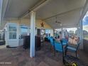 Covered patio with seating area, great for relaxing at 650 N Hawes Rd # 2713, Mesa, AZ 85207