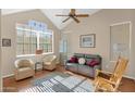 Bright living room with vaulted ceilings, neutral walls, and lots of natural light at 11222 E Oberlin Way, Scottsdale, AZ 85262