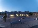 Beautiful home with desert landscaping, circular driveway and mountain views at 12560 E Cochise Dr, Scottsdale, AZ 85259