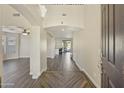 Bright and spacious entryway with wood-look flooring and high ceilings at 1278 E Geona Ct, San Tan Valley, AZ 85140