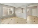 Bright living room with tile flooring and an open layout for flexible design options at 15118 W Lincoln St St, Goodyear, AZ 85338