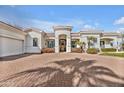 Beautiful single-story home with a circular driveway leading to the front entrance at 1560 W Augusta Ave, Phoenix, AZ 85021