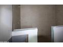 Bathroom featuring light brown tile and sleek fixtures at 431 W Rough Rider Rd, New River, AZ 85087