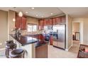 Modern kitchen with granite countertops and stainless steel appliances at 5350 E Deer Valley Dr # 4248, Phoenix, AZ 85054