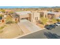 Beautiful home featuring a desert landscape with native trees and a neutral earth-tone stucco exterior at 8606 S 30Th St, Phoenix, AZ 85042