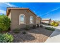 Stylish single-story home with low maintenance desert landscaping at 10501 W Swayback Pass, Peoria, AZ 85383