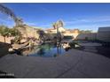 Relaxing pool area with waterfall feature at 11340 E Stearn Ave, Mesa, AZ 85212