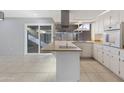 Updated kitchen with wood countertops and a breakfast bar at 225 N Standage St # 78, Mesa, AZ 85201