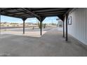 Spacious carport offering ample covered parking and protection from the elements at 358 N 82Nd Way, Mesa, AZ 85207