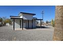 Contemporary home's exterior features clean lines and a minimalist design at 358 N 82Nd Way, Mesa, AZ 85207