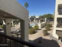 Community pool and relaxing patio area, perfect for outdoor enjoyment at 5518 E Lindstrom Ln # 2004, Mesa, AZ 85215