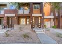 Two-story townhome with private entrance and walkway at 6605 N 93Rd Ave # 1070, Glendale, AZ 85305