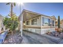 Lovely single-story home featuring covered parking and an inviting outdoor space at 7750 E Broadway Rd # 906, Mesa, AZ 85208