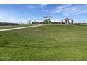 Community park with playground, covered pavilion and grassy area at 4517 S 95Th Dr, Tolleson, AZ 85353