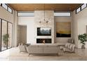 Spacious living room featuring a fireplace, large windows, and comfortable seating at 8226 E Davenport Dr, Scottsdale, AZ 85260
