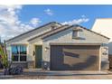 New construction home with a modern design and desert landscaping at 2038 E Dry Wood Rd, Phoenix, AZ 85024