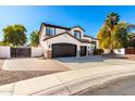 Beautiful two-story home features a large driveway, three-car garage, and well-maintained yard at 4467 E Kelly Ct, Gilbert, AZ 85298