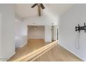 Open living room features sleek hardwood flooring, neutral paint, and lots of natural light at 1905 E University Dr # 216, Tempe, AZ 85288