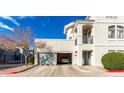 Elegant stucco home with a private garage and balcony offers modern living and beautiful architectural details at 295 N Rural Rd # 259, Chandler, AZ 85226