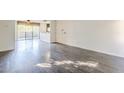 Spacious living room with sliding glass doors to the outdoor patio at 4950 N Miller Rd # 135, Scottsdale, AZ 85251