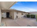 Inviting patio with tiled flooring, comfortable seating, and desert-inspired decor at 12814 W Shadow Hills Dr, Sun City West, AZ 85375