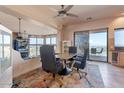 The dining room boasts lots of light and a private balcony at 16141 E Thistle Dr, Fountain Hills, AZ 85268