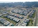 An aerial view shows a home's location in a neighborhood with mountain views at 727 E Monte Way, Phoenix, AZ 85042