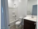 Clean and bright bathroom with shower and tub, vanity with sink and chrome hardware at 23252 W Miami St, Buckeye, AZ 85326