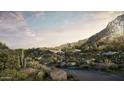 A view of a modern house nestled into the mountain with desert landscaping and native vegetation at 5648 N Superstition Ln # 5, Paradise Valley, AZ 85253