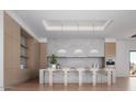Bright, modern kitchen featuring sleek cabinetry, central island, and pendant lighting at 6602 N 40Th St, Paradise Valley, AZ 85253