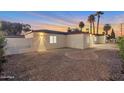 Well-maintained home featuring desert landscaping, upgraded exterior lighting, and plenty of privacy at 701 W Windsor Ave, Phoenix, AZ 85007