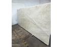 Large marble slab featuring a unique pattern and protective film, ready for countertop or design applications at 11500 E Cochise Dr # 2067, Scottsdale, AZ 85259