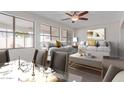 Bright and airy living room with large windows, neutral decor, and stylish furnishings at 17816 W Mariposa Dr, Surprise, AZ 85374