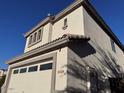 A view of the corner of the home showing the garage and the house number at 3229 S 93Rd Ave, Tolleson, AZ 85353