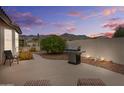 Outdoor patio featuring a built-in grill and mountain views perfect for entertaining at 6353 S Eagle Ct, Gold Canyon, AZ 85118