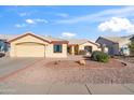 Single-story home featuring a well-maintained yard and neutral exterior, offering a comfortable and inviting curb appeal at 8736 W Kathleen Rd, Peoria, AZ 85382