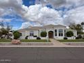 Inviting single-story home with lush green lawn and classic design at 2251 N 32Nd St # 21, Mesa, AZ 85213