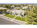 A sprawling luxury property with a tile roof is enhanced by a meticulously manicured lawn at 2251 N 32Nd St # 21, Mesa, AZ 85213