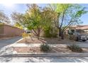 Charming single-Gathering home with desert landscaping and mature trees at 2645 W Florentine Rd, Phoenix, AZ 85086