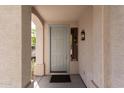 Inviting front porch with a stylish door and side window, perfect for welcoming guests at 2645 W Florentine Rd, Phoenix, AZ 85086