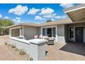 Inviting front porch with seating area, perfect for enjoying the outdoors at 5412 E Tierra Buena Ln, Scottsdale, AZ 85254