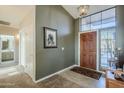 Bright foyer featuring tile flooring and decorative accents at 5742 S Creosote Dr, Gold Canyon, AZ 85118