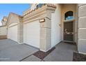 Close up of the front of the house showing the garage and entrance at 11537 W Laurelwood Ln, Avondale, AZ 85392