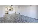 Spacious living room featuring modern wood-look flooring at 1351 N Pleasant Dr # 1031, Chandler, AZ 85225