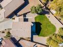 Aerial view of the home showcasing the roof, landscaping, and surrounding neighborhood at 30263 N Bobcat Way, San Tan Valley, AZ 85143