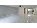 Spacious open living room features tile floors and flows into the kitchen at 7530 E Mariposa Dr, Scottsdale, AZ 85251