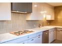 Charming kitchen featuring stainless steel appliances, bright backsplash, and modern countertops at 2201 N Central Ave # 2A, Phoenix, AZ 85004