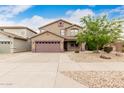 Attractive two-story home with a two-car garage and low-maintenance desert landscaping at 22905 N 19Th Way, Phoenix, AZ 85024