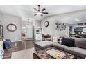 Inviting living room featuring hardwood floors and ample natural light at 1353 N Avoca --, Mesa, AZ 85207